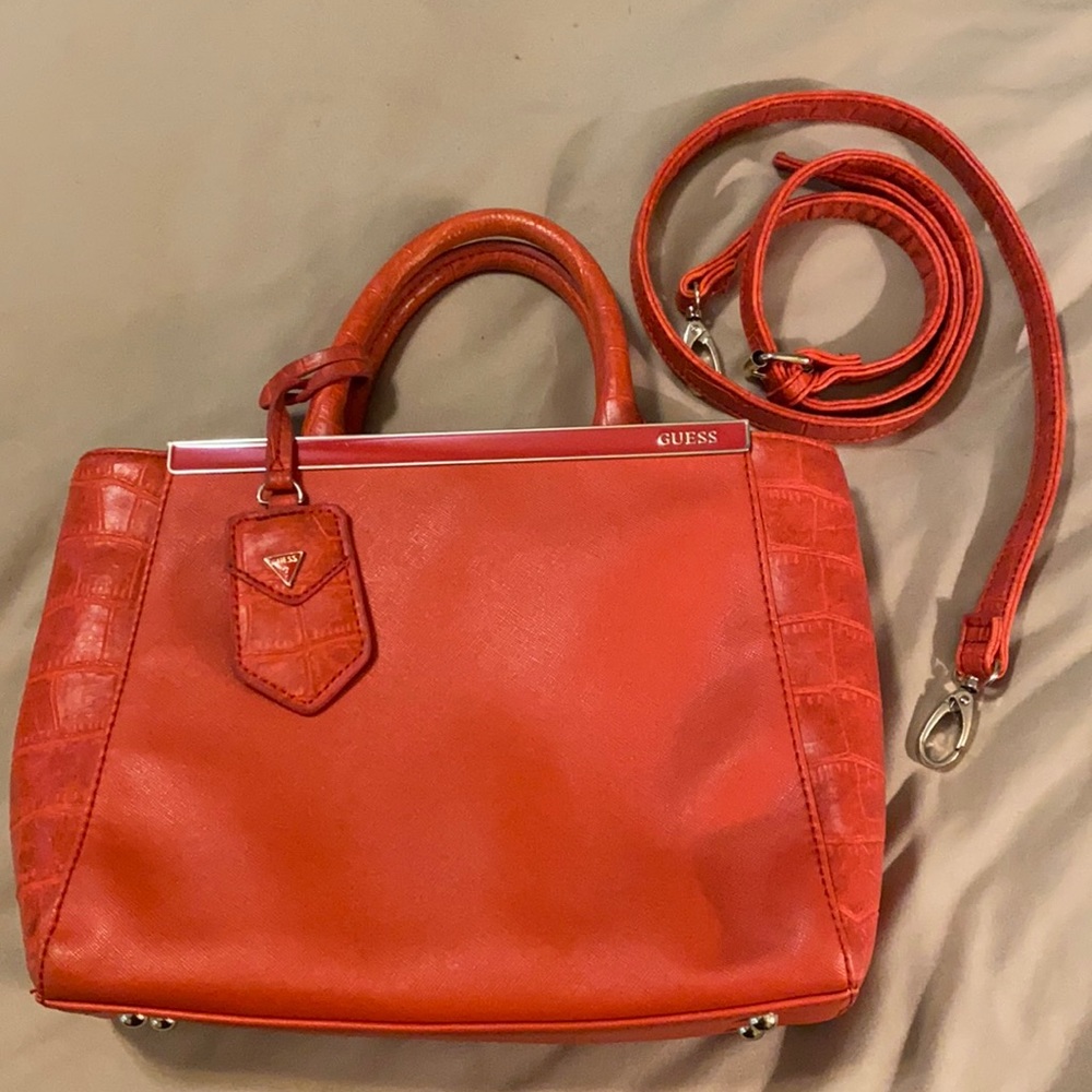Guess purse a reddy orange color